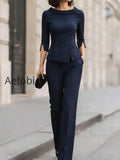 tailored-navy-peplum-blazer-wide-leg-trouser-suit